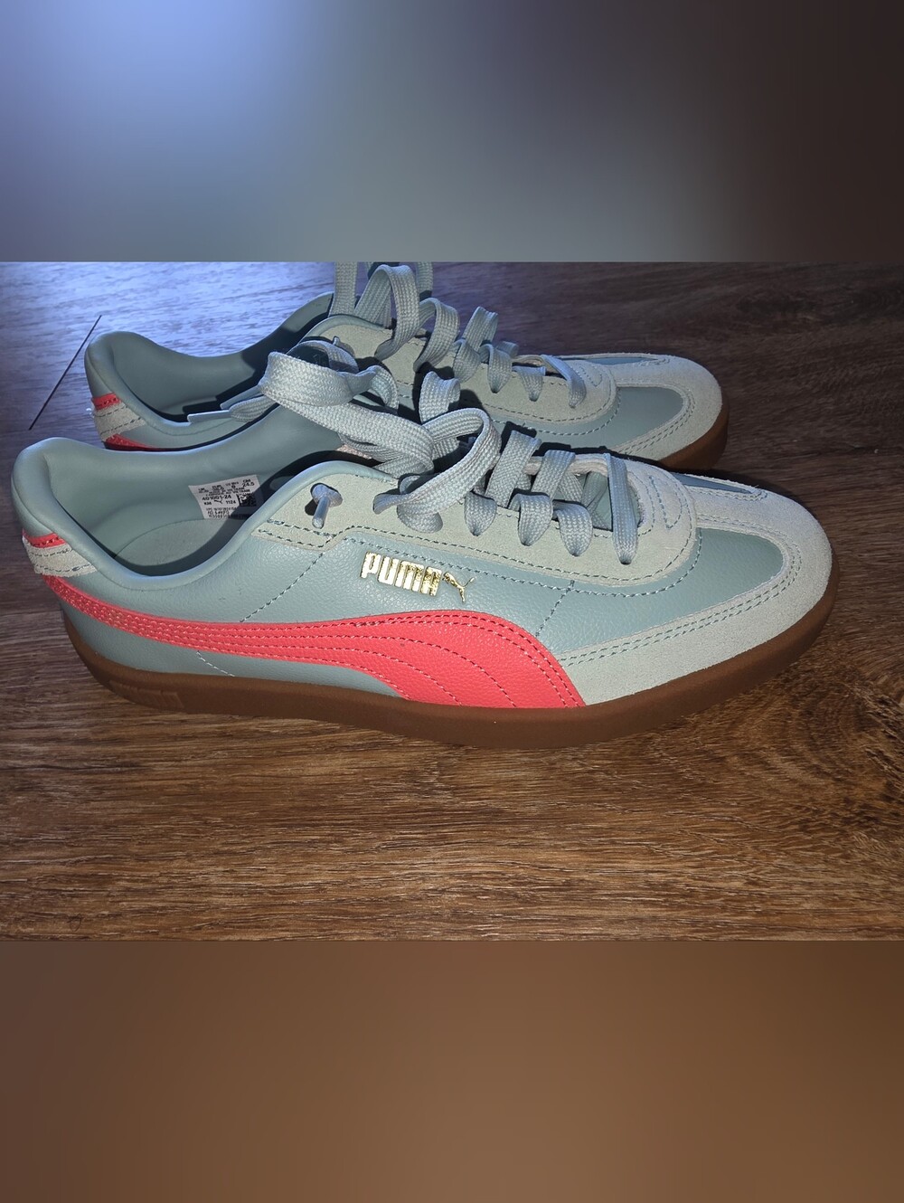 Brand New Womens Puma's Size 8 light blue sneakers with coral stripe No Box